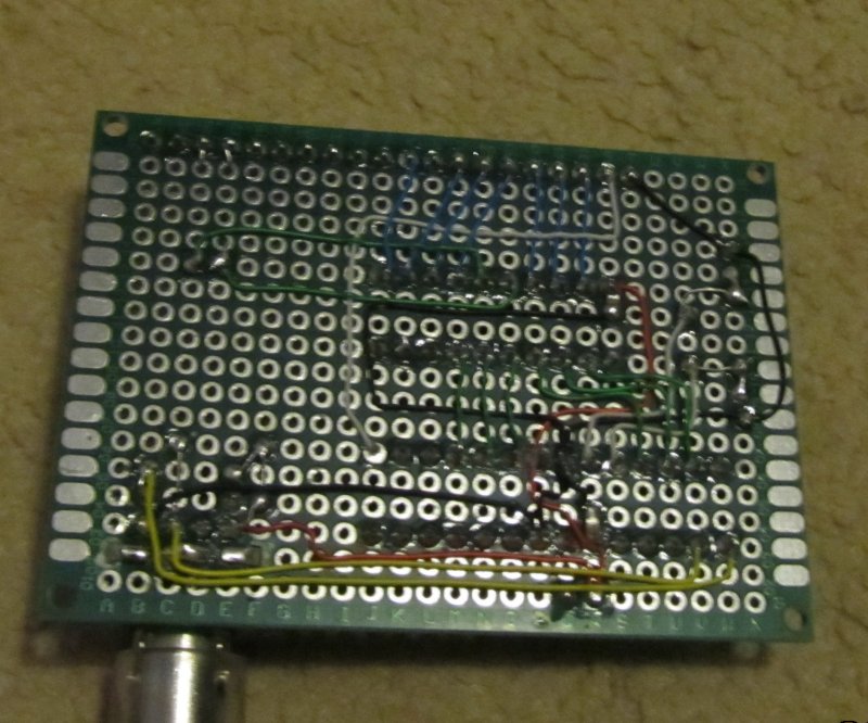 Wiring side, 7 blue wires are keyboard drive lines, the long green ones are sense. The short green ones connect the GAL to the AVR. The long yellow ones are mouse clock and data