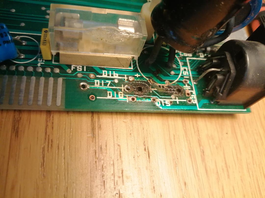 Removed all the diodes, and tried to clean up the PCB, broken and burned traces.
