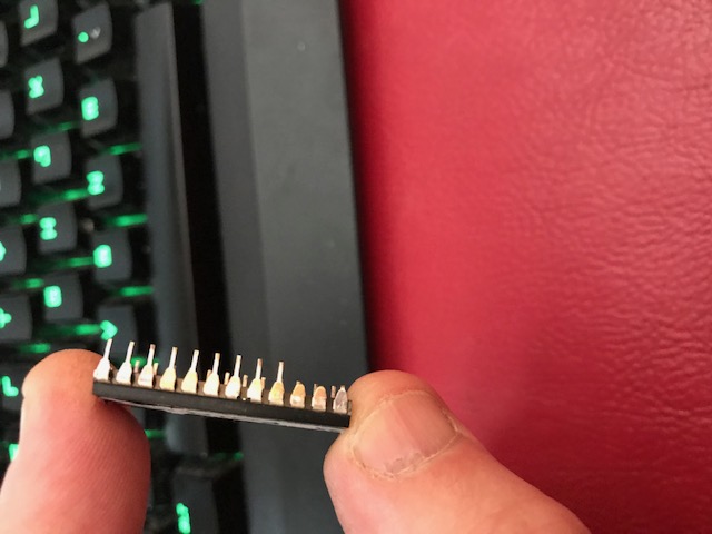 That's right, I'd bent pins 1,2 and 3 when I put the ROMS back in after selling the Rememorizer. Pin 1 was making contact I think.